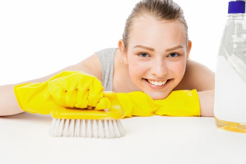 Professional office cleaning in a W1W workspace with desks and meeting areas